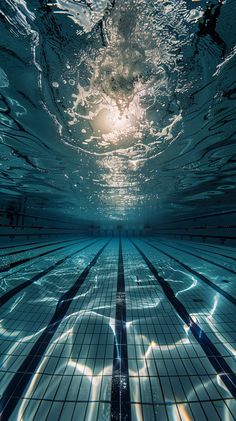 an underwater swimming pool with the sun shining down on it's floor and water surface