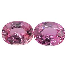 two pink diamonds are shown side by side on a white background, one is cut in half and the other has an oval shape