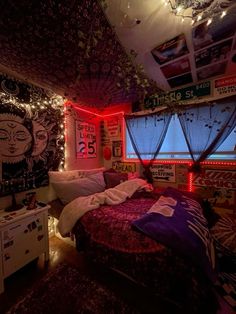 a bed room with a neatly made bed and lots of lights