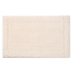 a white bath mat on a white background