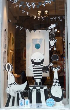 a window display with black and white decorations