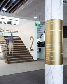 the inside of an office building with stairs