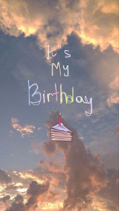 a birthday card with a cake in the sky