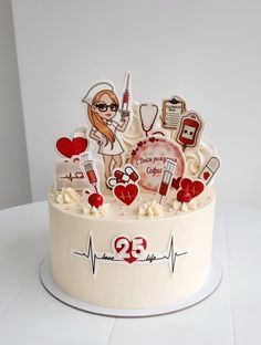 a white cake decorated with medical related items