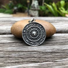 Handcrafted Solid Sterling Silver .925/ Zodiac Circle Pendant 100% hand-polished solid sterling silver One of the very first concepts of astrology, the 12 zodiac signs, were created by the Babylonians in 1894 BC. The zodiac is a diagram used by astrologers to represent the positions of the planets and stars. It is divided into twelve sections, each of which has its own name and symbol. The zodiac is used to try to calculate the influence of the planets, especially on someone's life. Width 3.0cm, Silver Zodiac Sign Amulet Jewelry, Symbolic Zodiac Sign Jewelry, Symbolic Zodiac Sign Collectible Jewelry, Round Zodiac Sign Jewelry Collectible, Collectible Round Zodiac Sign Jewelry, Silver Zodiac Sign Medallion Jewelry, Zodiac Circle, Astronomy Stars, Beautiful Notes