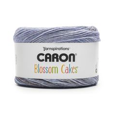 yarn that is blue and gray with the words canon written in white on top of it