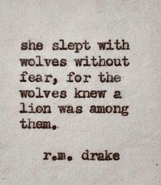 an old typewriter with the words, she slept with werewolvess without fear for the wolf