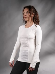 Cyberpunk sweater with thumbhole sleeves. The garment is made of breathable and soft viscose fabric combined with textured polyester fabrics ensuring comfort and a smooth feel against the skin. Not only do the sleeves have thumbholes but also the cuff is made narrow. This way sleeves hug the arms while thumbholes are used and don't slip down if you put sleeves in the regular mode.   KEY FEATURES Subtle tech-wear style for an edgy look Breathable and soft fabric for maximum comfort Made with spec Thumb Hole Shirts, Thumb Holes, Edgy Look, Viscose Fabric, Mesh Fabric, Women Pullover, Sweater Sizes, Pullover Sweaters, Cyberpunk