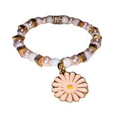 Beautiful Stretchy Bracelet with 12mm pink and gold-colored flower charm.   Accent bracelet for your ensemble glossy white round and pearl-colored beads with gold accents.  Beaded Bracelet includes dangling 12 mm flower charm. Handmade with love and care by Grandma B, this bracelet has great colors.  Wear every day or for special occasions.  Gift for Mother's Day, Anniversaries, Holidays, Birthdays or any other occasion. Flower Charm Bracelet, Art Deco Bracelet, Novelty Mugs, Stretchy Bracelets, Flower Charm, Beaded Dangles, Glossy White, Mother Day Gifts, Gold Accents