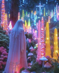 an assortment of colorful lights and trees in a forest with mushrooms, rocks and flowers