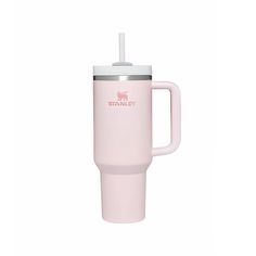 a pink travel mug with a straw sticking out of the lid and handle, on a white background