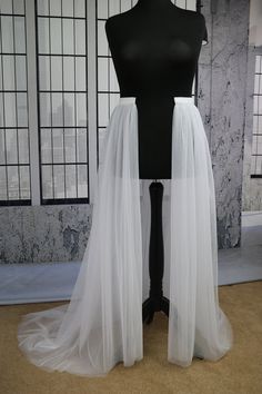 3 layers soft tulle detachable skirt /detachable train, long 150cm and with satin belt.  Length options: 150cm, 180cm, 200cm.  Hem width - 3 metres.  Please contact me if you want to order skirt with different length or more layers tulle. *DELIVERY We use standard delivery service for the UK with Royal Mail 1st class service which normally takes 1-2 working days without tracking. For international delivery we use Royal Mail International Tracked service which takes 5-7 working days normally. *CU Bridal Skirt Separate, Detachable Wedding Dress, Bridal Skirt, Tulle Train, Detachable Skirt, Bow Wedding Dress, Satin Belt, Bridal Skirts, Detachable Train