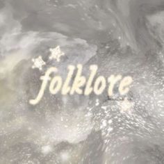 the word folklore written in white on a gray background with snowflakes and stars