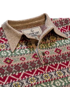 This unique polo collar jumper comes with a myriad of desirable features, such as a spearpoint collar, tall waistband and football buttons. Made of 100% 5gg wool, this is a natural pairing with the new Ellington Flannel Trousers Featuring rich burgundy, jade, forest and biscuit hues. Collared Polo Sweater With Buttons For Winter, Brown Collared Wool Sweater, Collared Wool Sweater With Buttons, Football Buttons, Flannel Trousers, Denim Polo, Collar Jumper, Rich Burgundy, Clothes Collection