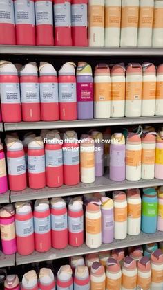 the shelves are filled with many different colored containers