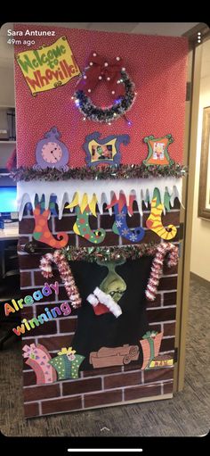 a bulletin board is decorated with christmas decorations