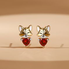 Chic and adorable, these earrings in Hug Me® collection portray the intriguing forest creature in style. Crafted in sterling silver, each features a shimmering heart-cut stone hugged by a cute baby fox. Each cute baby fox is so cute with his smiling face. Would make a great gift for anyone who loves these mysterious and majestic creatures. You will find more adorable and creative designs in our Hug Me® collection.Carat Weight: 1 ctStone Size: 5*5 mmStone Type: Jeulia® StoneNumber of Stones: 2 St Valentine's Day Silver Earrings With Birthstone, Fine Jewelry Heart Earrings For Gift, Valentine's Day Silver Birthstone Earrings, Silver Birthstone Earrings For Valentine's Day, Silver Heart Earrings With Birthstone For Gift, Cute Sterling Silver Heart Earrings For Gift, Fox Heart, Majestic Creatures, Forest Creatures