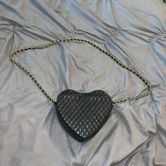 Black Heart Shaped Mini Bag ~Black Mini Heart Shaped Cross Body Style Purse With Zipper Closure And Gold Wrapped Strap~ - Colors: Black, Gold - Materials: Quilted Leather - Brand: No Brand - Size: Mini Bag - Condition: Brand New Never Worn Or Used - Tags: #Minibag #Heart #Goth #Leather #Goingout Black Shoulder Bag For Valentine's Day, Trendy Black Heart-shaped Shoulder Bag, Black Heart-shaped Shoulder Bag For Everyday Use, Black Heart-shaped Bag For Gift, Black Shoulder Bag For Valentine's Day Gift, Heart-shaped Black Shoulder Bag For Party, Chic Black Bag For Valentine's Day, Chic Black Heart-shaped Shoulder Bag, Chic Black Heart-shaped Bag