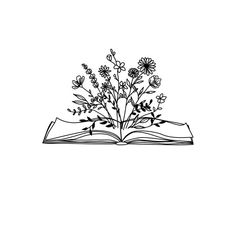 an open book with flowers on it