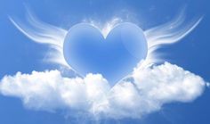 a heart shaped cloud with angel wings in the sky