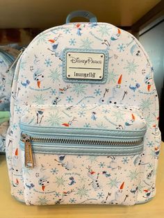 New Olaf Loungefly Bag: Something Worth Melting For Frozen Illustration, Loungefly Purse, Disney Bags Backpacks, Diy Disney Ears, Swag Bags, Disney Purse, Cute Mini Backpacks, Disney Loungefly, Disney Inspired Fashion