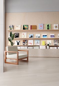 interior shot of a living room with shelves and magazines and a sustainable cork floor Creative Studio Space, Sustainable Flooring, Vibrant Living Room, Book Stores, Natural Flooring, Scandinavian Interiors, Cork Flooring, Apartment Style, Flooring Ideas