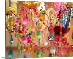 a chandelier with many colorful beads hanging from it