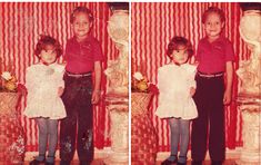 two children standing next to each other in front of a red and white striped wall