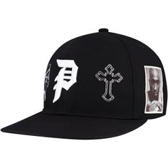 Represent one of hip-hop's most influential figures with this Tupac Shakur Royalty Snapback Hat. It features raised embroidery on the front crown and a wordmark logo on the back, making it instantly recognizable to fans of the hip-hop legend. This snapback also has a structured fit and a flat bill for a classic look. Flat Cap For Baseball Season Streetwear, Black Hat With Logo Print And Flat Brim, Black Snapback Hat With Flat Crown For Streetwear, Hip Hop Black Fitted Hat With Embroidered Logo, Embroidered Logo Fitted Hat For Streetwear, Hip Hop Flat Bill Baseball Cap For Baseball Season, Flat Cap Fitted Hat With Embroidered Logo For Streetwear, Black Hip Hop Fitted Hat For Streetwear, Black Snapback Hat For Streetwear