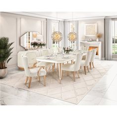 a dining room table with white chairs and chandelier hanging from the ceiling in front of a fireplace