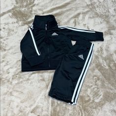 Adidas 6 Months Black And White Jumpsuit Never Worn Smoke Free Home Fitted White Adidas Sets, Adidas White Long Sleeve Set, Adidas Black Long Sleeve Set, Adidas Black Sports Sets, Adidas Black Fitted Sets, Fitted Black Adidas Sets, Black And White Jumpsuit, Black White Jumpsuit, White Jumpsuit