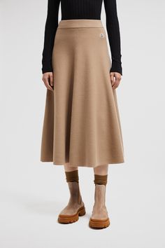 Inspired by timeless fashion, this skirt is crafted from a luxurious blend of Merino wool and cotton. Style with warm knits and refined puffers for a sophisticated winter look. Sweatpants For Women, Personalized Jacket, Cotton Midi Skirt, Cardigan Shirt, Outerwear Outfit, Skirts For Women, Jeans Online, Ski Pants, Dress With Cardigan