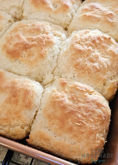 a baking pan filled with freshly baked biscuits