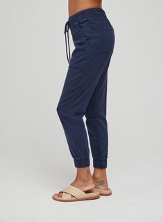 The Pocket Jogger is an everyday pant with a drawstring waist, cuffed ankles and side and back pockets. 60% TENCEL™ Lyocell, 38% Cotton, 2% Spandex. MEASUREMENTS (Inches): Size Waist Waist to Hem Inseam XS: 28" 36 1/2 26 1/2 S: 30" 37 26 1/2 M: 32" 37 1/2 26 1/2 L: 34" 18 26 1/2 XL: 36" 18 1/2 26 1/2 Imported 60% TENCEL™ Lyocell, 38% Cotton, 2% Spandex Machine wash cold Elastic drawstring waist Front and back pockets Elasticized cuffs Model is 5'10" and wearing a size XS B3675-626-303 Everyday Athleisure Bottoms With Cargo Pockets, Athleisure Bottoms With Cargo Pockets For Everyday, Workwear Pants With Elastic Waistband And Cuffed Ankles, Relaxed Mid-rise Everyday Pants, Relaxed Tapered Leg Joggers With Pockets, Relaxed Drawstring Pants For Everyday, Everyday Relaxed Fit Bottoms With Drawstring, Relaxed Fit Drawstring Bottoms For Everyday, Everyday Mid-rise Bottoms With Elastic Waistband