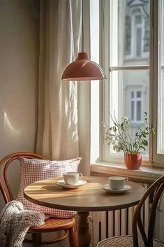 The Tiny Apartment Guide to a Cozy Bistro Corner 2 Cosy Nook Ideas, Round Table In Corner, Small Sitting Area In Kitchen, Bistro Nook, Sitting Area In Kitchen, Cozy Bistro, Corner Dining Nook, Living Decor Ideas, Dreamy Interiors