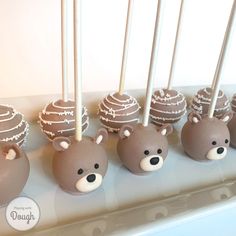 there are chocolate cake pops with teddy bears on them