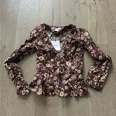 This Cute Top From Glamorous Features Long Sleeves, A Low Cut Neckline And Button Detailing At The Bodice. New With Tags Size Us 4 Tall Brown Floral Print Long Sleeve Tops, Brown Vintage Print Collared Top, Brown Floral Print Long Sleeve Blouse, Brown Graphic Print Button-up Top, Brown Bohemian V-neck Top, Brown Floral Print, Floral Print Tops, Brown Floral, Low Cut