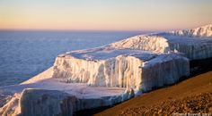 an ice covered mountain in the middle of nowhere