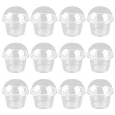 twelve clear plastic containers with lids on each side and one empty container in the middle