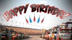 a group of cars driving down a race track with the words happy birthday on it