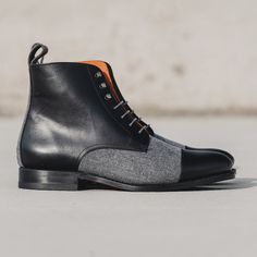 A modern twist on a classic military style. Stay sharp with this unique twist on our jumper boot. Features: Light Grey Flannel vamp and back Box Calf Black Zurigo traditional rounded toe Orange Leather Lining Old Silver Metal Grey Laces Black Outsole Leather Orange Sole Handcrafted with Passion Goodyear Welt Construction Can be Resoled Fitted Cap Toe Lace-up Boots For Fall, Winter Business Lace-up Boots Fitted, Fitted Cap Toe Boots, Fitted Winter Business Lace-up Boots, Fitted Business Lace-up Boots For Winter, Fitted Lace-up Boots For Business In Winter, Winter Goodyear Welted Cap Toe Chelsea Boots, Winter Lace-up Cap Toe Boots With Reinforced Heel, Winter Combat Boots With Leather Sole And Snip Toe