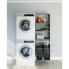 a washer and dryer stacked on top of each other in a laundry room