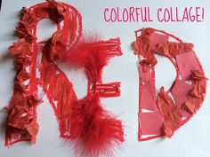 a collage of red paper and feathers on a white background with the word love spelled out