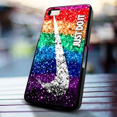 a colorful phone case with the eiffel tower painted on it's side