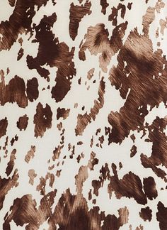 a brown and white animal print fabric