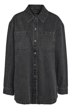 Cut from sturdy nonstretch denim and finished in a black wash, this oversized button-up shirt looks and feels like a vintage find from the first wearing. Front button closure Spread collar Long sleeves with button cuffs Chest patch pockets 50% organic cotton, 50% cotton Machine wash, dry flat Imported Washed Black Denim Button-up Top, Oversized Black Denim Tops, Washed Black Button-up Denim Jacket, Classic Black Denim Top, Oversized Dark Wash Button-up Denim Top, Oversized Denim Top With Button Closure For Fall, Oversized Washed Denim Button-up Top, Oversized Dark Wash Denim Top With Button Closure, Washed Black Snap Button Denim Jacket