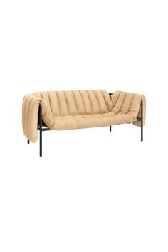 a beige leather couch with black legs and arms on an isolated white background for use as a sofa or bed