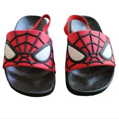 - Size: 5 - Age 2 Years Old - Spiderman - Color: Red And Black - Silicone Spiderman Upper - Sandals - Elastic Back Strap At The Heel - New With Box Playful Black Non-slip Sandals, Playful Non-slip Black Sandals, Playful Black Sandals For The Beach, Playful Red Open Toe Sandals, Adjustable Non-slip Red Sandals, Cute Red Sandals For Summer, Fun Red Open Toe Sandals, Fun Black Sandals For Vacation, Cute Red Sandals For The Beach