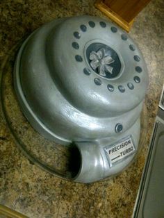 a metal object sitting on top of a counter