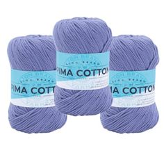 three skeins of yarn in purple